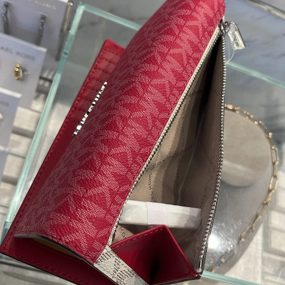 MICHAEL KORS Jet Set Travel Signature Logo Tri-Fold Wallet
DARK RASPBERRY MULTI - Picture 8 of 16